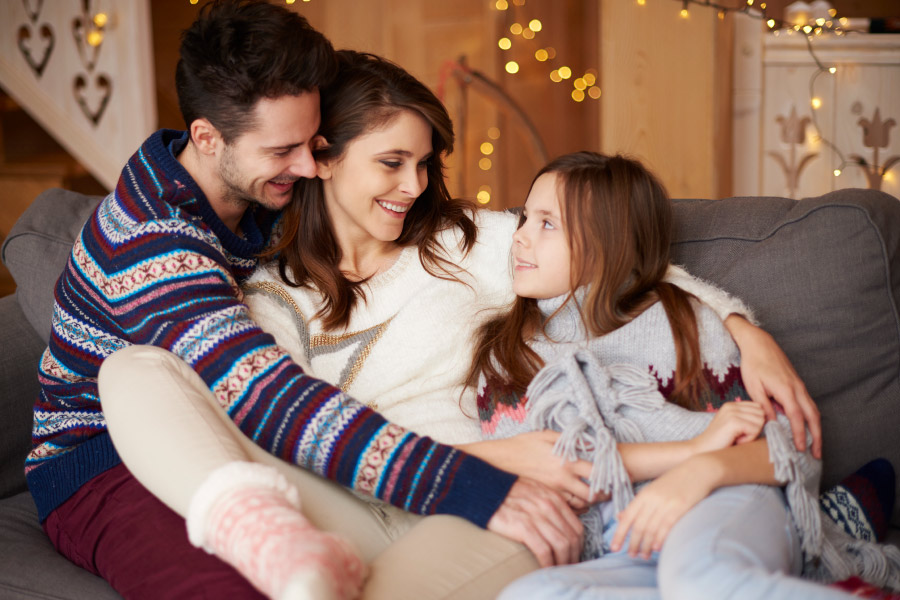 Family enjoying warmth in living room