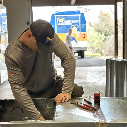 Technician working on unit